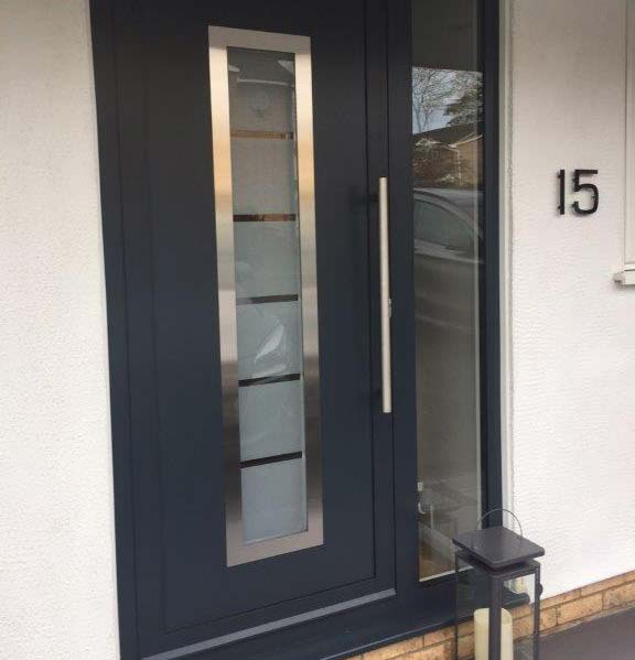 Aluminium entrance door with frosted glass in dark grey finish