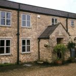 Domestic installation with new aluminium windows suited to traditional property