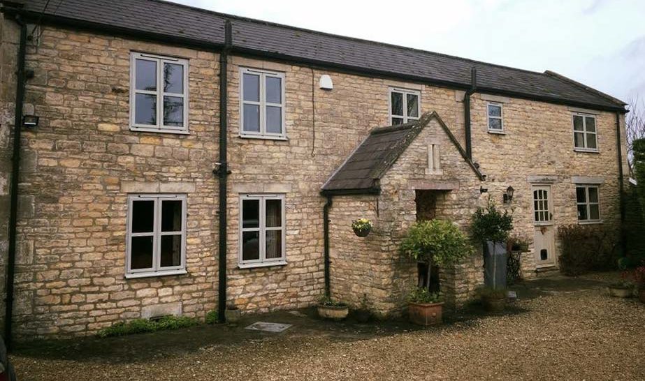 Domestic installation with new aluminium windows suited to traditional property