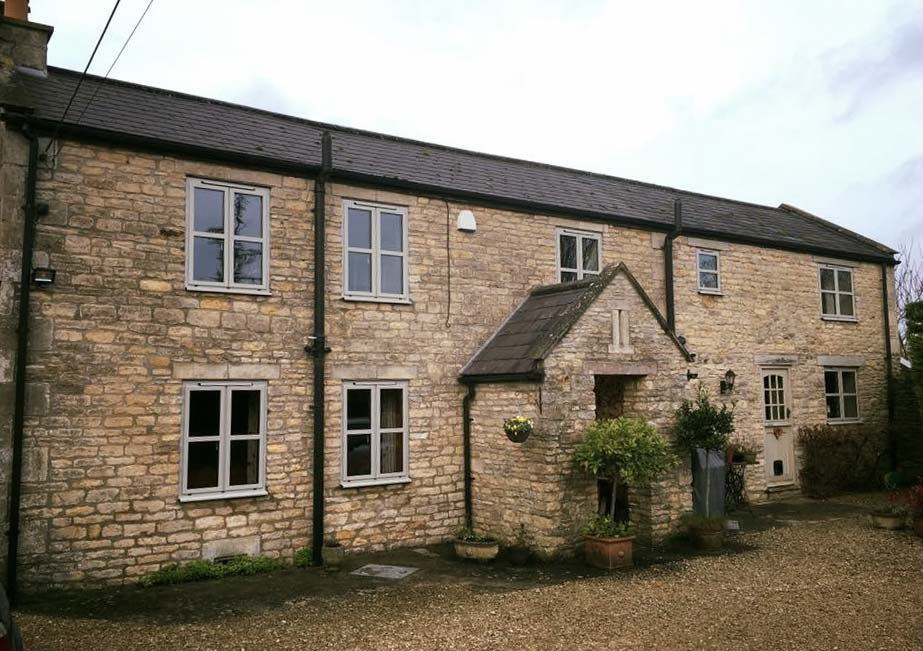 Domestic installation with new aluminium windows suited to traditional property