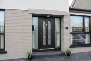 Composite door installation with tall glazed panels and side lights