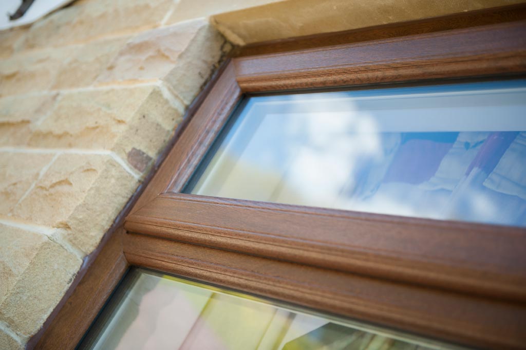 Sculptured sash timber effect window manufactured using the Deceuninck uPVC 2500 system